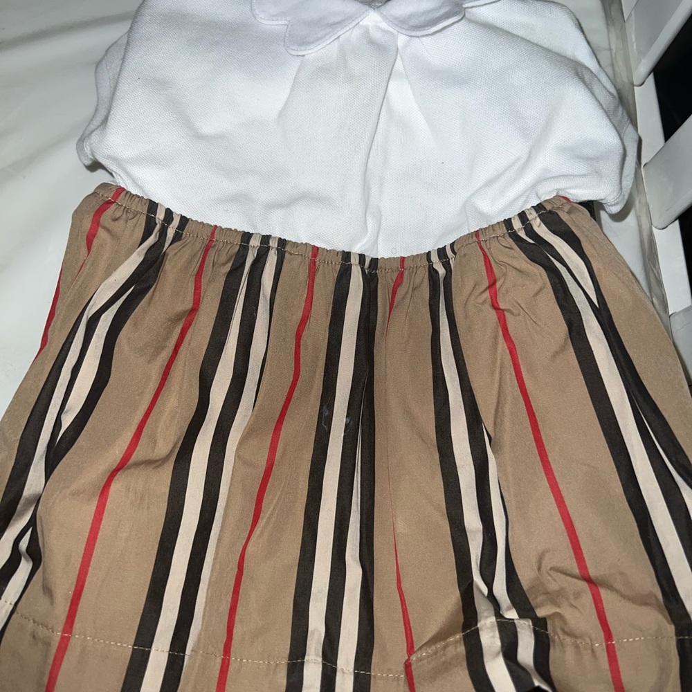 Burberry dress 6 months but runs big Still with tags never worn box and receipt